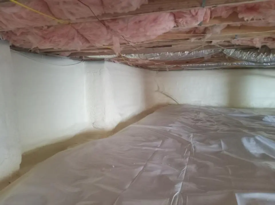 Crawl space encapsulation with closed-cell spray foam for Storm Damage Roof Repair in Erie
